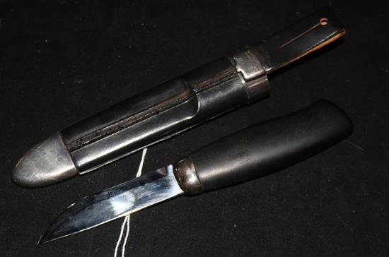 A boxed Norwegian sterling silver mounted ebonised handled knife by David Andersen.